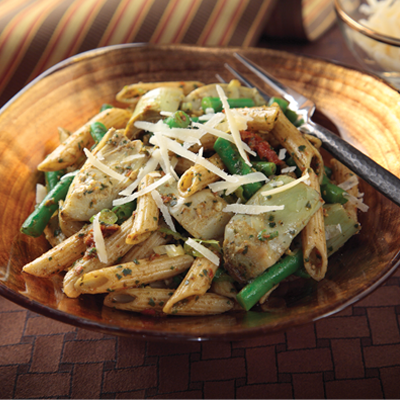 Made with delicious Cara Mia Artichoke Hearts, penne pasta,  and tender green beans all tossed in a divine Sun Dried Tomato Pesto Dressing, this salad is sure to make your taste buds very happy. #STARFineFoods