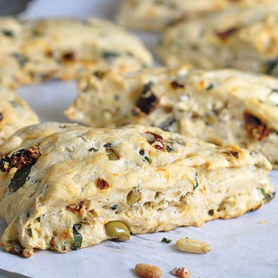 Bruschetta Scones – a savory scone with almond milk, spinach, basil, sun-dried tomatoes, pine nuts, feta cheese, and of course olives! #STARFineFoods