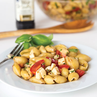 Caprese Pasta Salad Recipe – turn classic Caprese salad into a quick pasta salad. Great for summer get togethers, quick lunches, or a light dinner #STARFineFoods