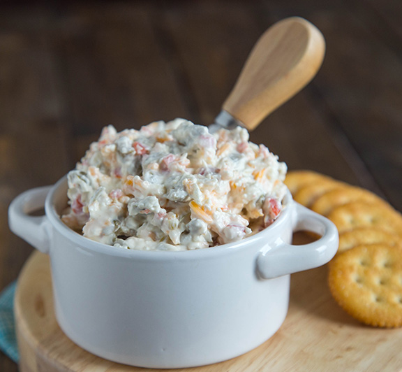 A creamy, cheesy, salty green olive, dip that is great warm or cold. #STARFineFoods