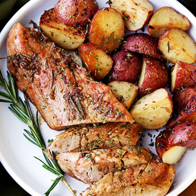 Easy to make, flavorful, incredibly tender pork loin rubbed with a Garlic and Rosemary Balsamic mixture makes for a crowd pleasing dinner with very little effort. #STARFineFoods