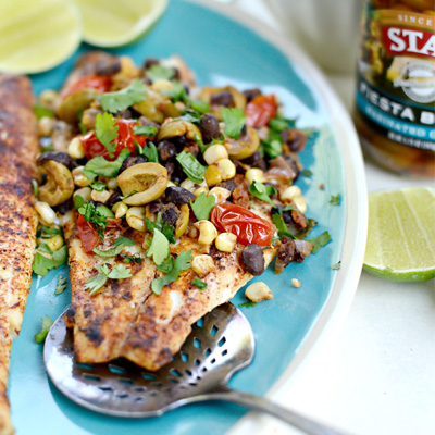 This red snapper is grilled to perfection and then topped with a warm olive topping made with STAR Flavor Destinations: Southwestern (Fiesta Blend) Marinated Olives. #STARFineFoods
