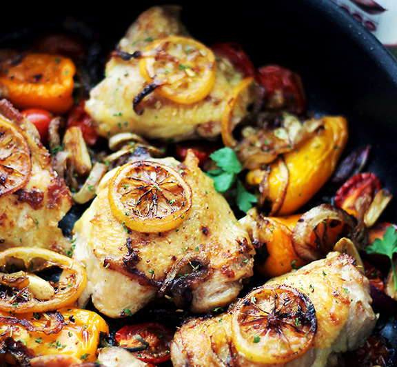 One Pot Lemon Garlic Chicken and Veggies recipe – Tender, garlicky, seared chicken thighs baked with sweet peppers, onions, and tomatoes.
 #STARFineFoods