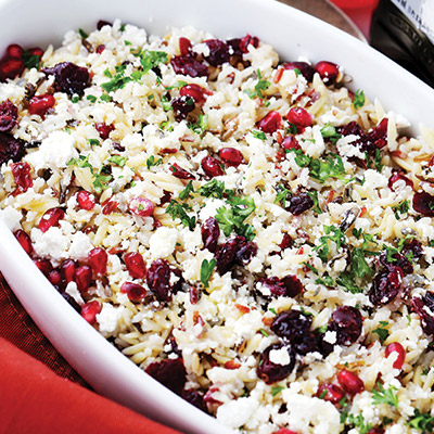 This cheesy orzo pasta salad is full of bright and colorful winter flavors tossed with a delicious dose of cranberry pomegranate vinaigrette. It's also the perfect side dish to share at your next holiday gathering! #STARFineFoods