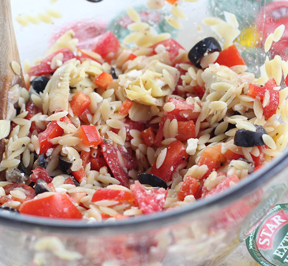 A simple Mediterranean-inspired orzo salad recipe with red wine vinegar & Olive Oil. Perfect for a quick weekday lunch. #STARFineFoods