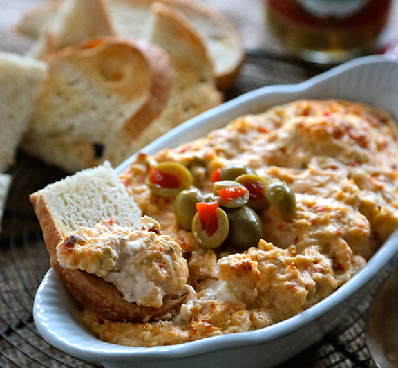 The holidays may be over, but football is not! Park it and load up for game day with this Roasted Red Pepper Olive Dip recipe for the playoffs today! #STARFineFoods