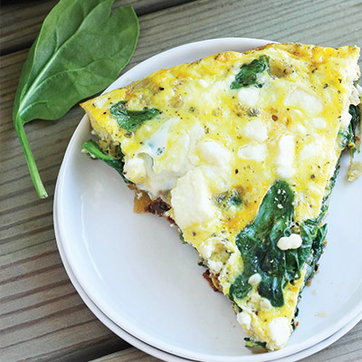 Try this simple, yet flavorful brunch frittata recipe with spinach, artichokes, sun-dried tomatoes, fresh herbs and feta cheese. #STARFineFoods