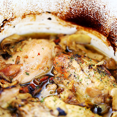 Melt-in-your-mouth chicken thighs prepared in the crock pot with artichoke hearts and sun-dried tomatoes. #STARFineFoods