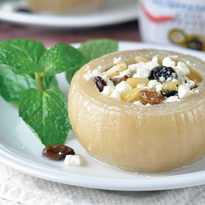 Try this Slow Cooker Greek Stuffed Onions recipe for a meal filled with creamy cheese, sweet raisins and just a dab of heat!   #STARFineFoods